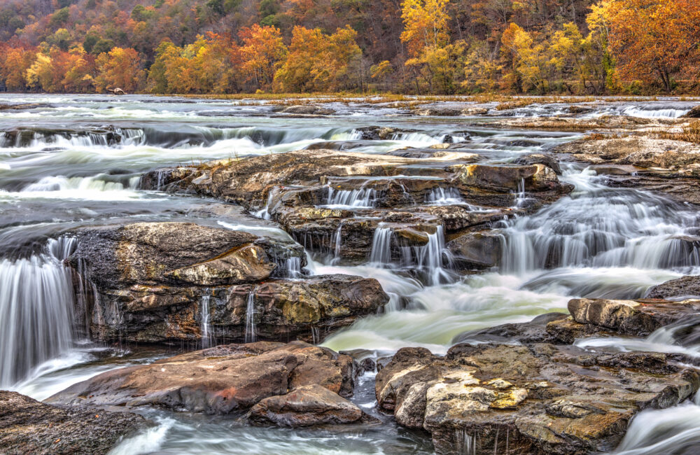 Water Cascading Over The Rocks At Sandstone Falls, West Virginia