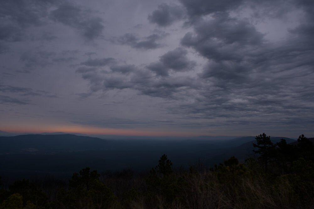 A cloudy sky in spring at sunrise from Panorama Vista, Talimena Scenis Drive, Oklahoma