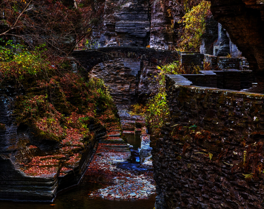 Autumn Colours And A Stone Bridge Over Enfield Creek At Robert H Treman State Park, NY